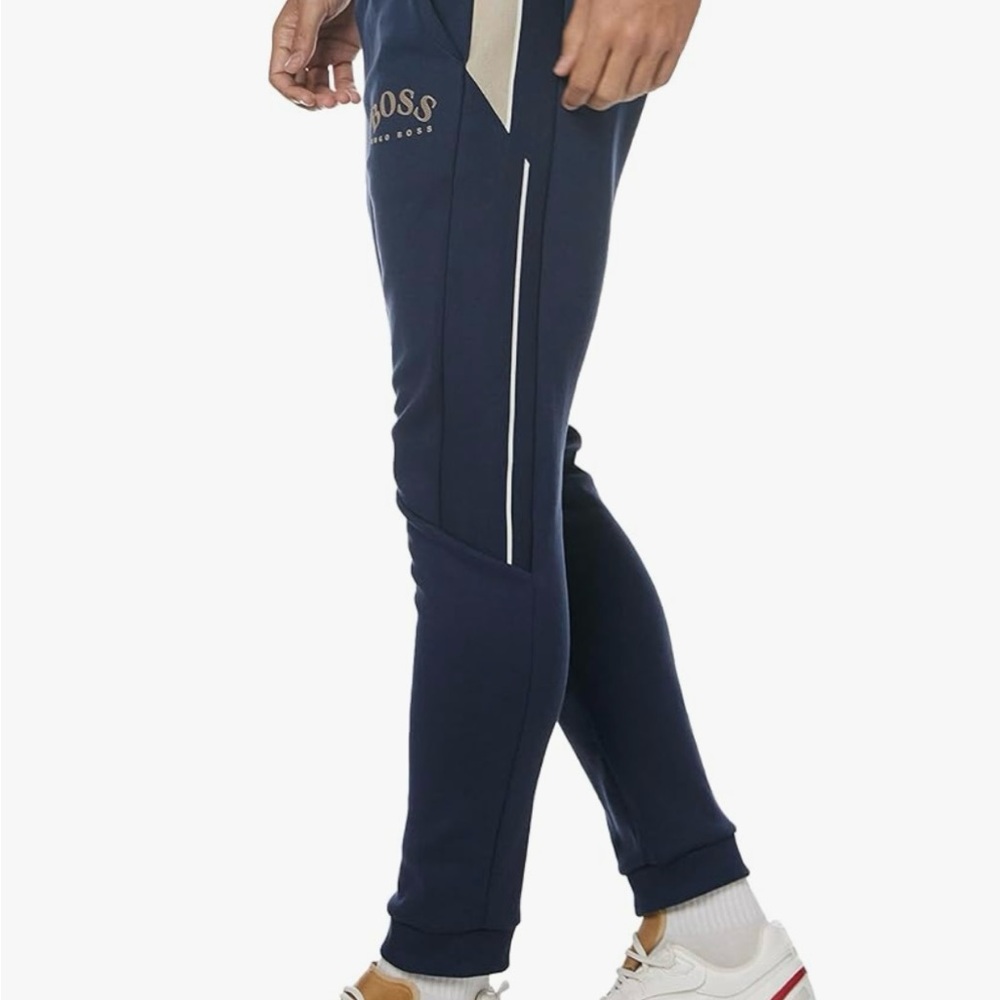 Hugo Boss hadiko 1 tracksuit bottoms in dark blue with contrast piping & stripe